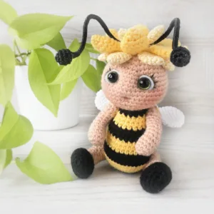 Crochet honeybee pattern – handmade amigurumi bee design with tiny wings and cheerful details by Monoxatoys